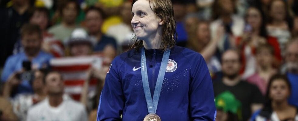 Katie Ledecky will wait to write history again