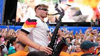 The German supporter who plays the saxophone has become a