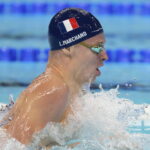 LIVE Swimming at the 2024 Olympics Marchand aims for a