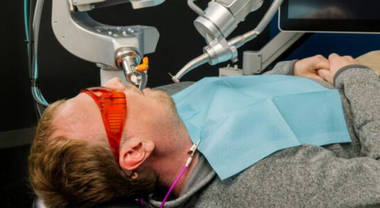 Robot dentist performs surgery on a human for the first