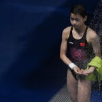 Why do divers take a shower immediately after their jump