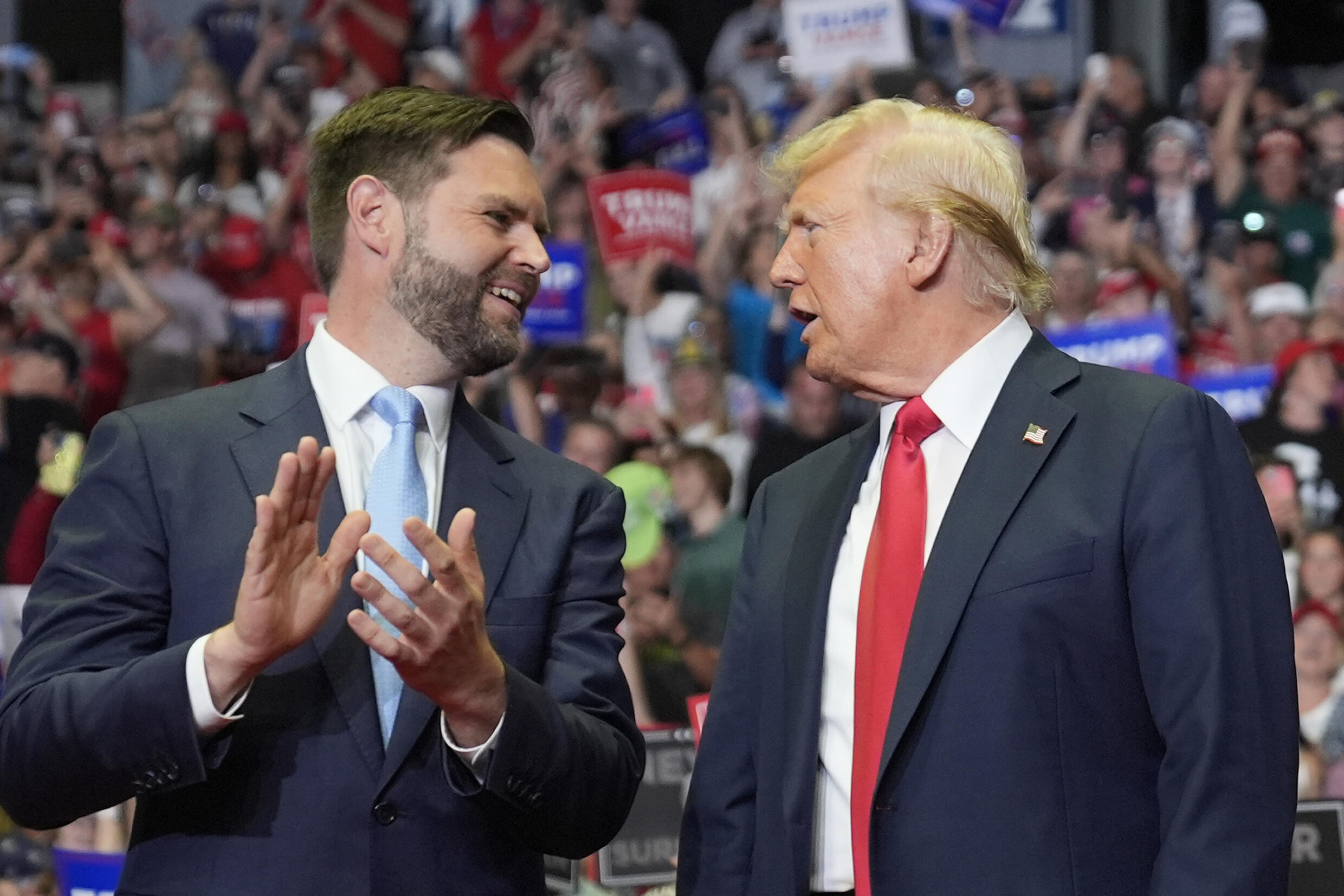 Republican presidential candidate Donald Trump and Republican vice presidential candidate Sen. JD Vance arrive at a campaign rally, Saturday, July 20, 2024, in Grand Rapids, Michigan, United States.