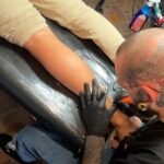 225 people get a tattoo of magical Dom Tower