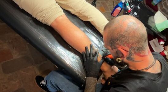 225 people get a tattoo of magical Dom Tower