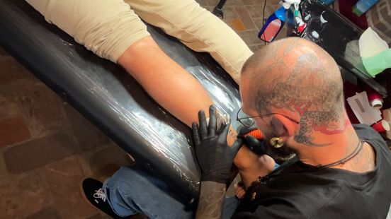 225 people get a tattoo of magical Dom Tower