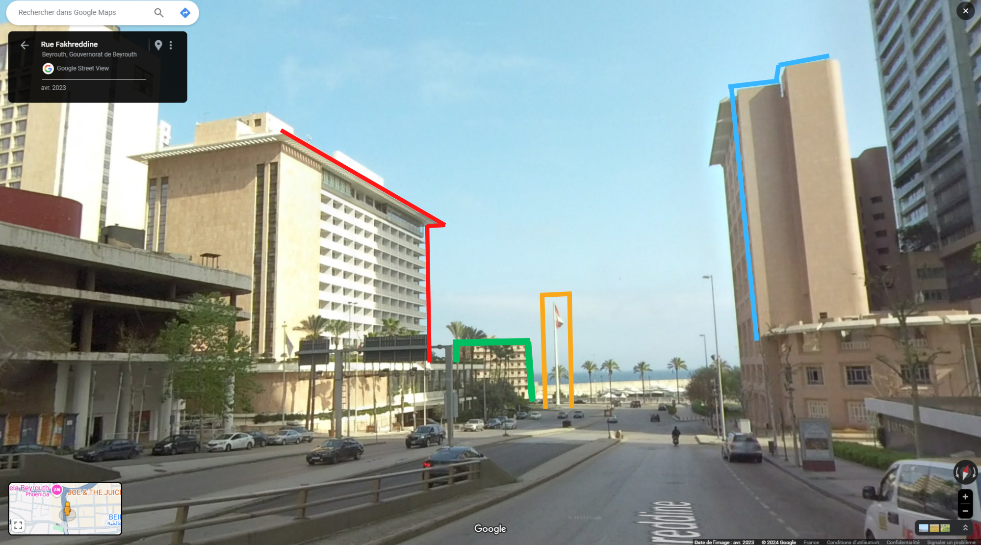 The scene takes place on Fakhreddine Street, in front of the Phenicia Hotel in Beirut.