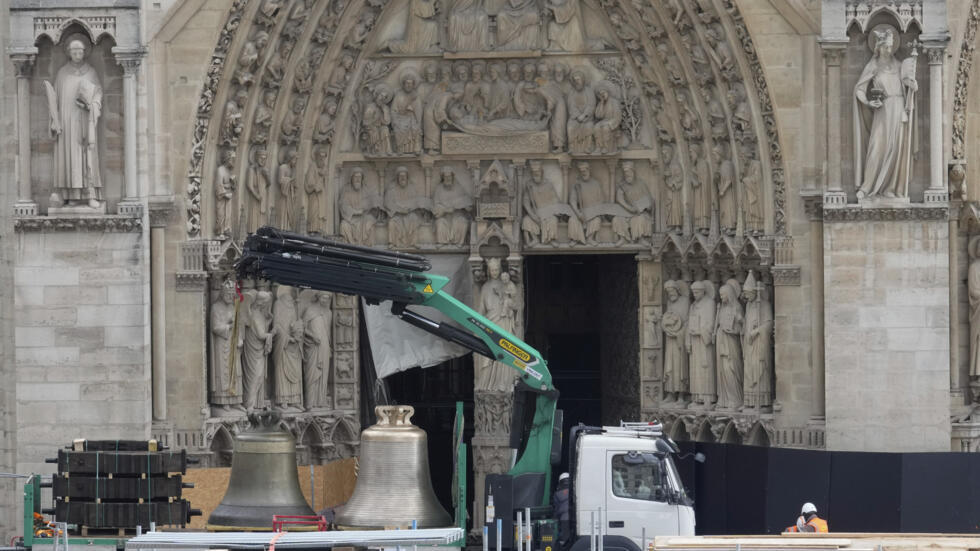 A truck carrying bells is parked in front of Notre-Dame de Paris Cathedral, in Paris, Thursday, September 12, 2024. The cathedral collects its bells for its reopening on December 8, 2024.