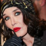 Isabelle Adjani adopts curtain bangs to enhance her blue eyes