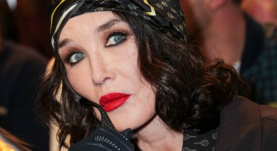 Isabelle Adjani adopts curtain bangs to enhance her blue eyes