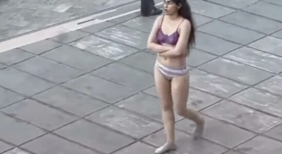 She stripped down to her underwear on the university campus