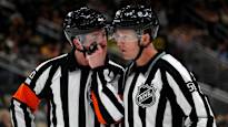 The NHL referee was carried off the ice after a