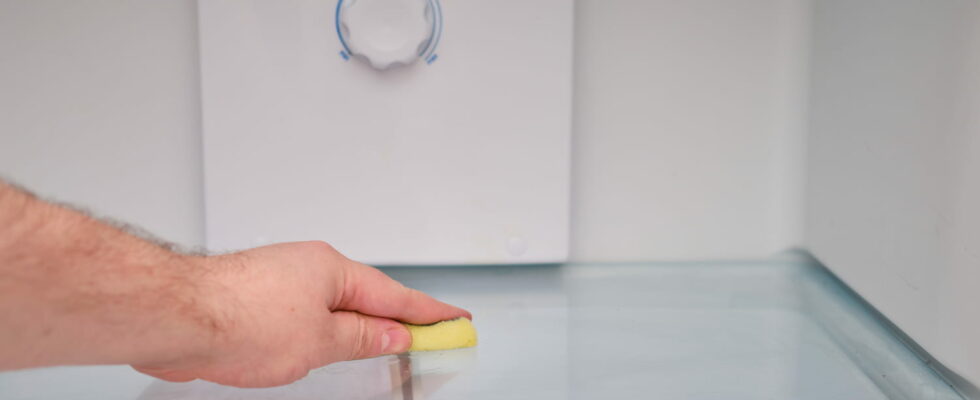 Water collects in the bottom of the refrigerator this