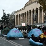 first session of the new Parliament after contested legislative elections