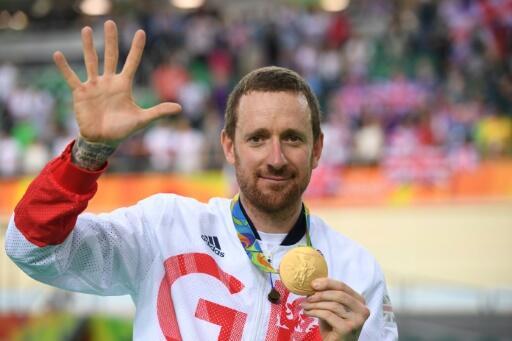 Britain's Bradley Wiggins poses on the podium after his victory in the pursuit final at the Rio Olympics, August 12, 2016