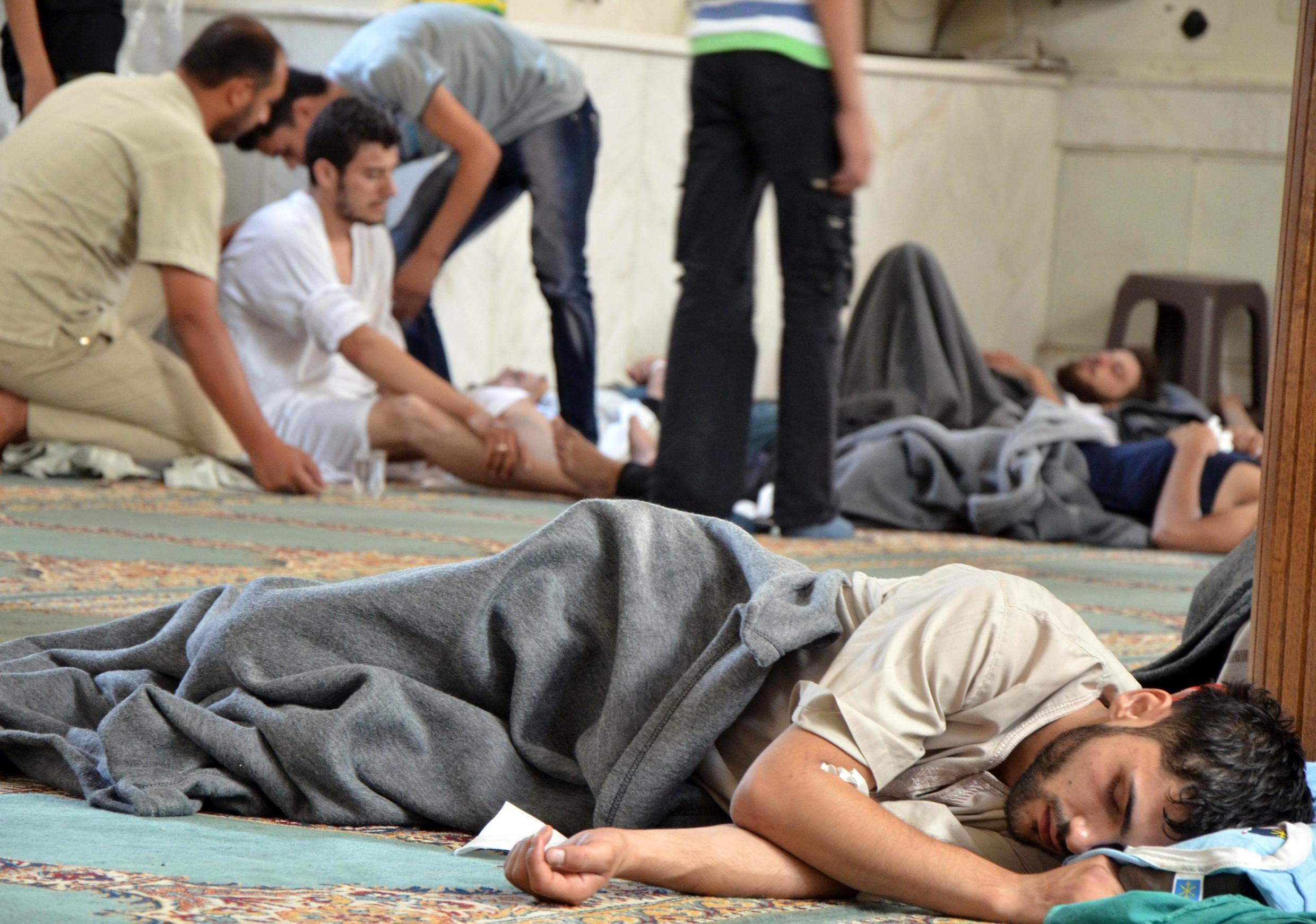 Civilian survivors of a chemical attack perpetrated by the Syrian regime in the Damascus region, August 21, 2013.