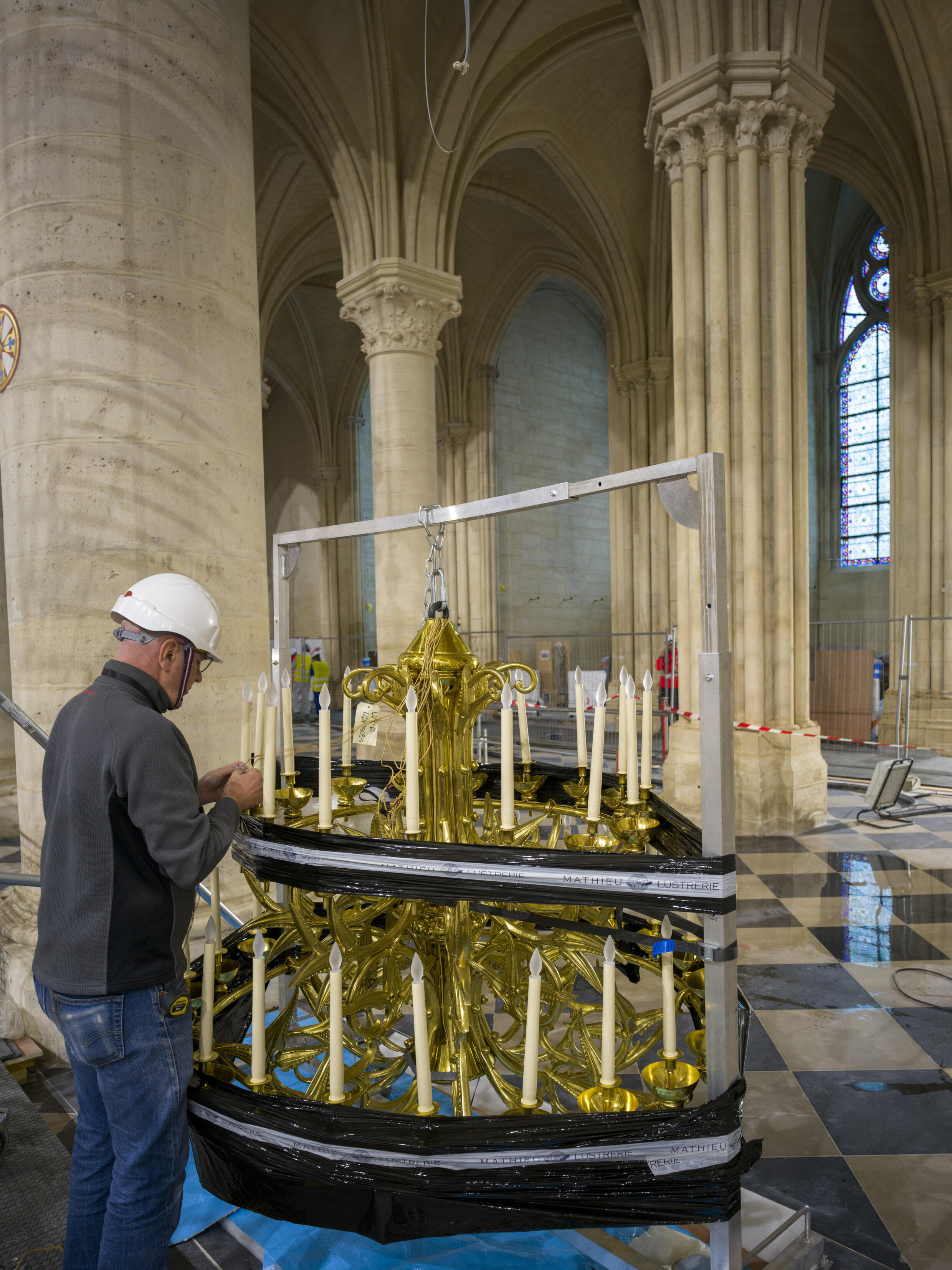 Installation of chandeliers at Notre Dame de Paris