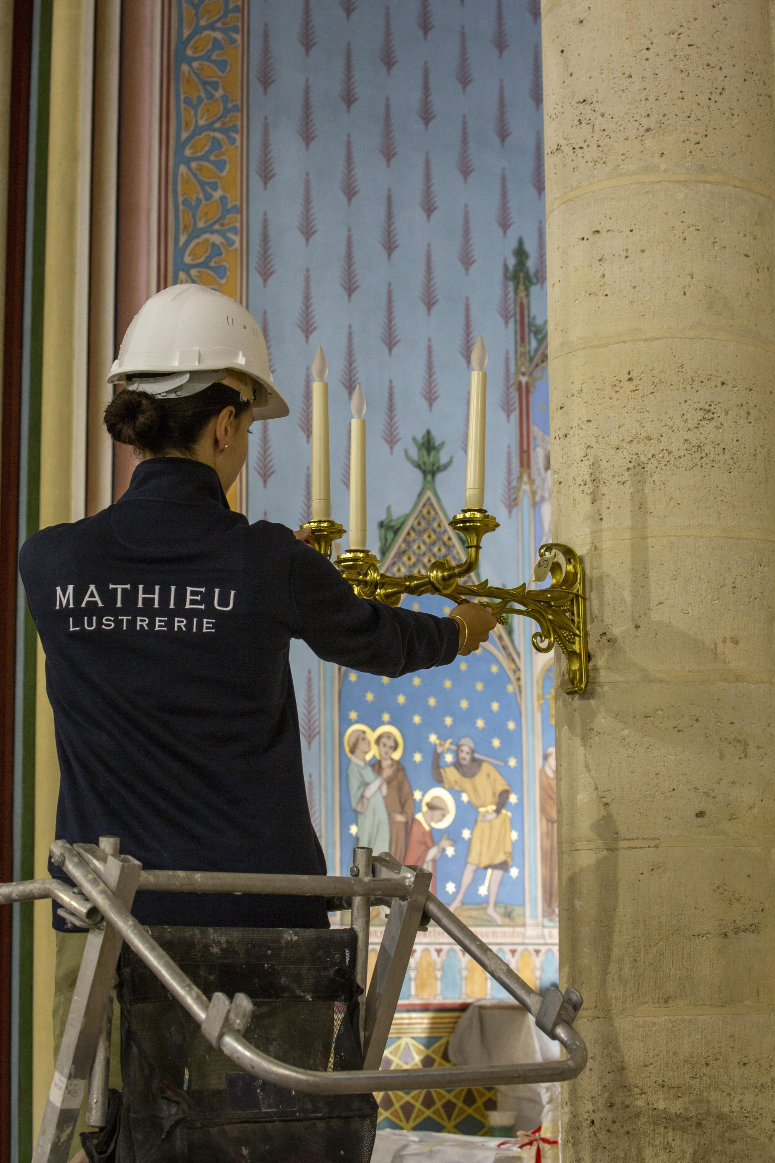 Installation of lighting at Notre-Dame de Paris.