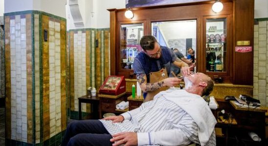 Barbershops and coffee shops take over shopping streets Cutting is