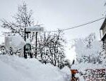 Central Italy digs out from record snow climbers who