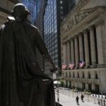 Wall Street rises slightly with payrolls supporting Fed cut