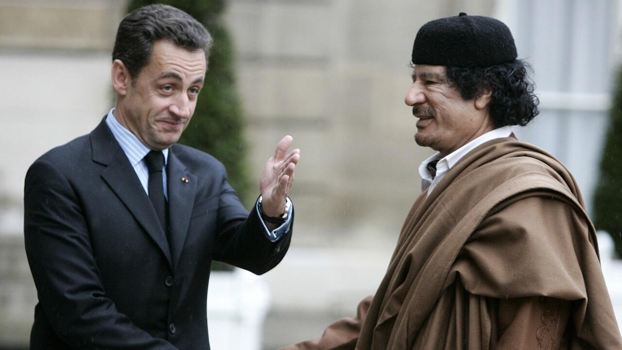 Nicolas Sarkozy welcoming Muammar Gaddafi to the Élysée Palace in Paris on December 10, 2007.