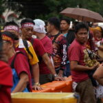 Filipinos pay homage in procession to the Black Nazarene