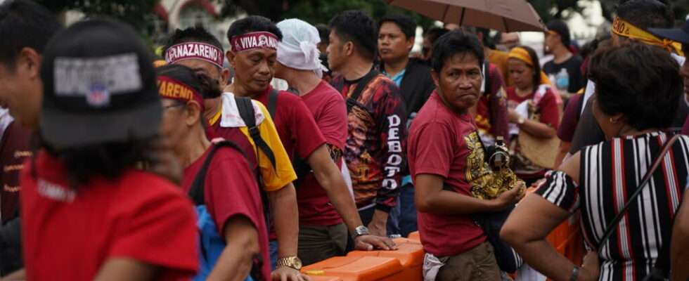 Filipinos pay homage in procession to the Black Nazarene