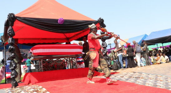 Liberia thousands of people at the funeral of ex warlord Prince