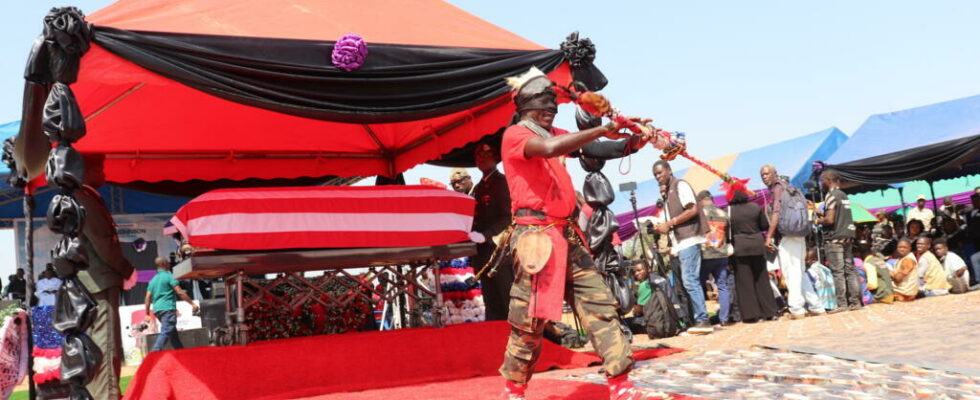 Liberia thousands of people at the funeral of ex warlord Prince