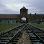 Poland commemoration of the Liberation of Auschwitz speech to survivors