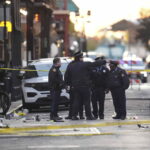 a vehicle rushes into the crowd leaving at least 10