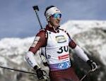 The Latvian biathlete says the coach has beaten him during