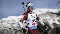 The Latvian biathlete says the coach has beaten him during