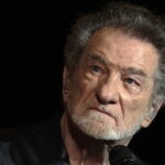 Eddy Mitchell suffers from a disease requiring treatment and prolonged