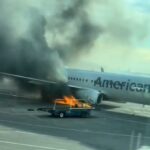 Passengers were lined up on the wing of the plane