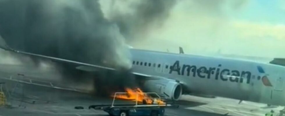 Passengers were lined up on the wing of the plane