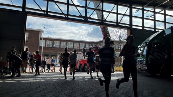 Running through shops a theater and the fire station 1400